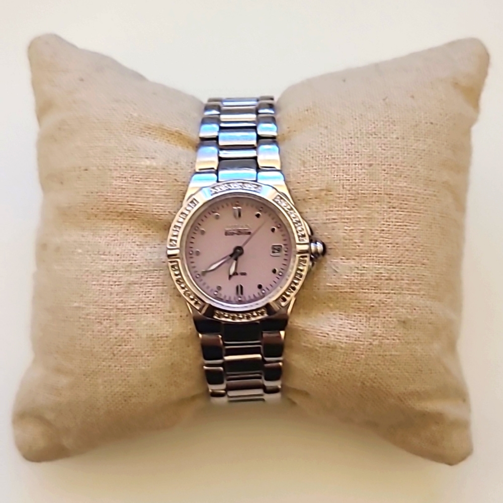 Citizen ladies Eco Drive watch with bezel diamonds and pink face